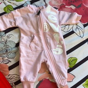 Newborn Levi’s onesie